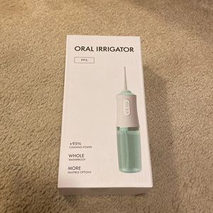 White oral irrigator